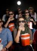 10740788-spectators-eating-popcorn-at-the-movie-theater.jpg